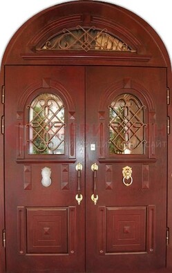 Стальная арочная дверь со стеклом и ковкой ДА-30 в дом из кирпича в Химках